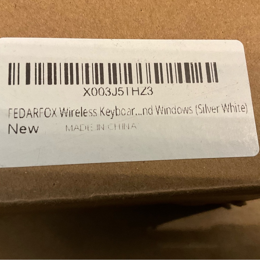 Amazon Silver Keyboard with Dual System Switching - Picture 3 of 3